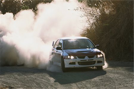 dusty environment - Rally car and clouds of dust Stock Photo - Rights-Managed, Code: 858-03049377