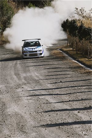 dusty environment - Rally car racing on racecourse Stock Photo - Rights-Managed, Code: 858-03049371