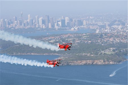 Airplanes flying together over sea Stock Photo - Rights-Managed, Code: 858-03049409