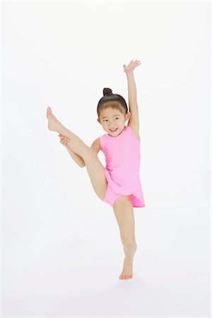 Girl performing rhythmic gymnastic Stock Photo - Rights-Managed, Code: 858-03050020