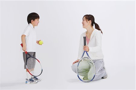 simsearch:858-03050428,k - Mother and son playing with badminton Stock Photo - Rights-Managed, Code: 858-03050038