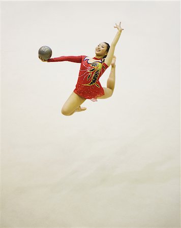 simsearch:858-03050208,k - Woman performing rhythmic gymnastics with ball Stock Photo - Rights-Managed, Code: 858-03050222