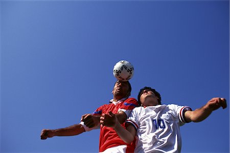 Challenging for the ball Stock Photo - Rights-Managed, Code: 858-03050967
