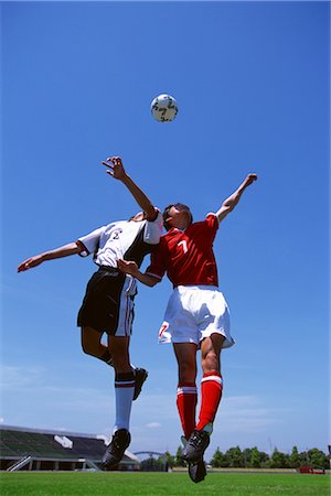 Challenging for the ball Stock Photo - Rights-Managed, Code: 858-03051213