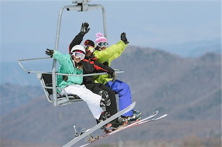 friends lifting someone - Snowboarders on a Chairlift Stock Photo - Rights-Managed, Code: 858-03448676