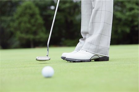 putter - Man Playing Golf Stock Photo - Rights-Managed, Code: 858-03694155