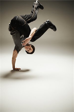 Hip Hop Dancer Performing in Studio Stock Photo - Rights-Managed, Code: 858-03694414