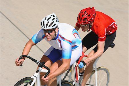 Cyclists racing on racetrack Stock Photo - Rights-Managed, Code: 858-03799737