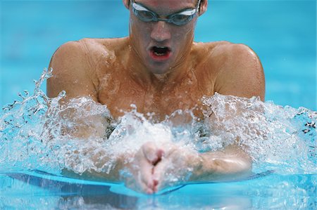 simsearch:858-06756400,k - Swimmer swimming in pool water Stock Photo - Rights-Managed, Code: 858-03799764