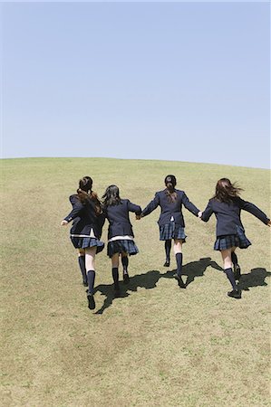 simsearch:859-06380209,k - Japanese schoolgirls running up a hill in their uniforms Stock Photo - Rights-Managed, Code: 859-06404859