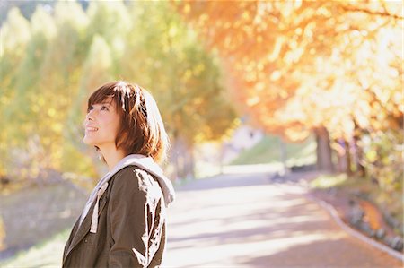 Portrait of a Japanese woman with short hair looking away Stock Photo - Rights-Managed, Code: 859-06404968
