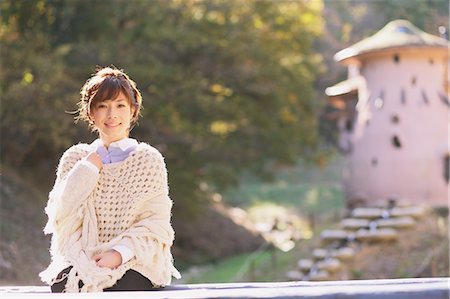 poncho - Portrait of a Japanese woman in a white cardigan looking at camera Stock Photo - Rights-Managed, Code: 859-06404974