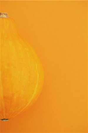 Puccini pumpkin on yellow background Stock Photo - Rights-Managed, Code: 859-06470083