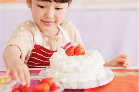Young girl making a cake Stock Photo - Rights-Managed, Code: 859-06537983