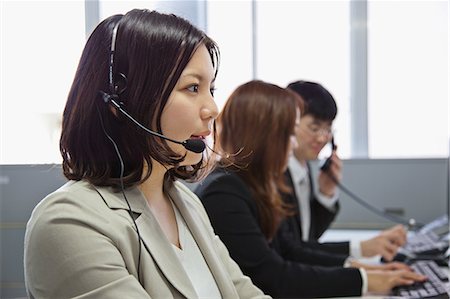 Businesswoman with headset Stock Photo - Rights-Managed, Code: 859-06538390