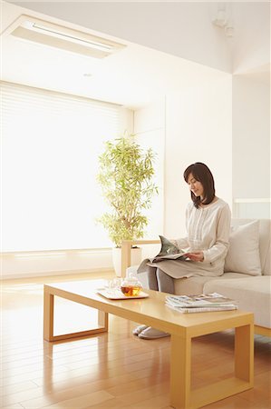 simsearch:859-06538435,k - Woman reading on the sofa Stock Photo - Rights-Managed, Code: 859-06538433
