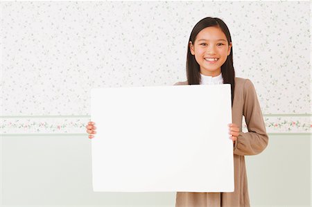 Girl With White Board Stock Photo - Rights-Managed, Code: 859-06617367