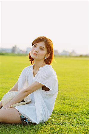 Woman Relaxing In Meadow Photographie de stock - Rights-Managed, Code: 859-06617520