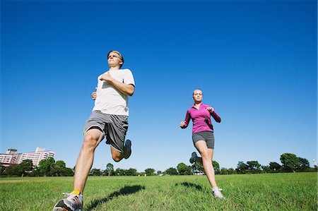 Couple running in a park Stock Photo - Rights-Managed, Code: 859-06711051