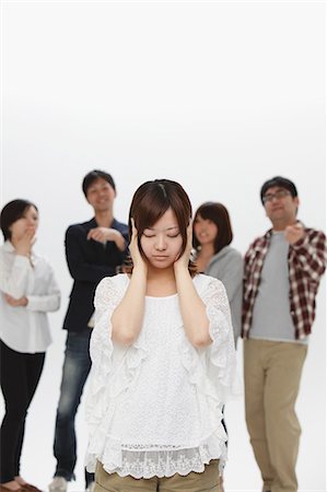 ethnic group of friends - Woman getting excluded from a group Stock Photo - Rights-Managed, Code: 859-06711159