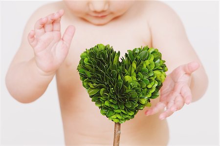 simsearch:859-06808649,k - Baby and heart-shaped plant Stock Photo - Rights-Managed, Code: 859-06808629