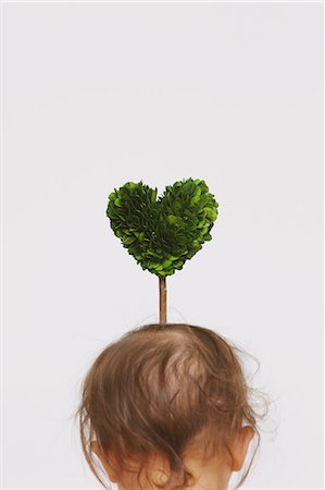 simsearch:859-06808649,k - Baby and heart-shaped plant Stock Photo - Rights-Managed, Code: 859-06808634