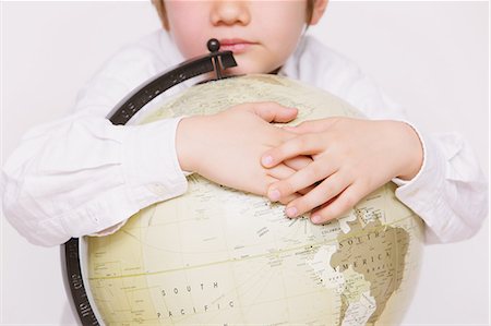 simsearch:859-06808650,k - Children embracing globe Stock Photo - Rights-Managed, Code: 859-06808672