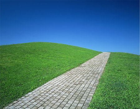 simsearch:859-03598857,k - Paved Path across Green Grass Stock Photo - Rights-Managed, Code: 859-07356263
