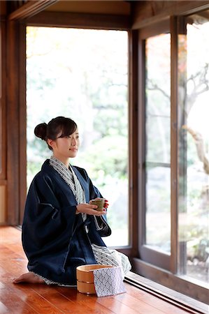 Japanese woman wearing a yukata at traditional ryokan, Tokyo, Japan Stock Photo - Rights-Managed, Code: 859-08993786