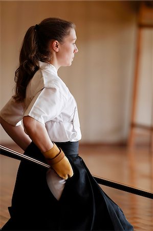 Caucasian woman practicing traditional Kyudo Japanese archery Stock Photo - Rights-Managed, Code: 859-09018742