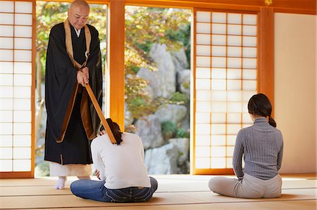 Japanese priest preaching to women at a temple Stock Photo - Rights-Managed, Code: 859-09155328