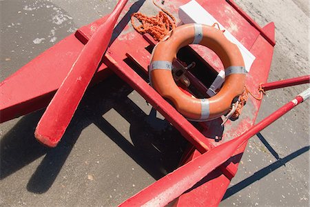 Boat at beach with life belt Stock Photo - Rights-Managed, Code: 859-03036374