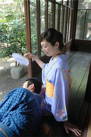 Woman Fanning her Husband Stock Photo - Rights-Managed, Code: 859-03037314