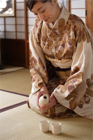 sake - Pretty Japanese woman pouring sake Stock Photo - Rights-Managed, Code: 859-03037967
