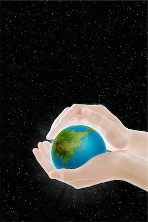 Close-up of hands holding globe Stock Photo - Rights-Managed, Code: 859-03038777