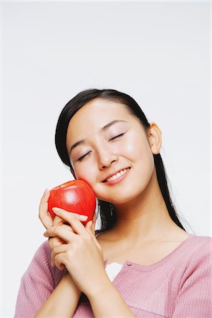 Girl Holding Fruit Stock Photo - Rights-Managed, Code: 859-03038991