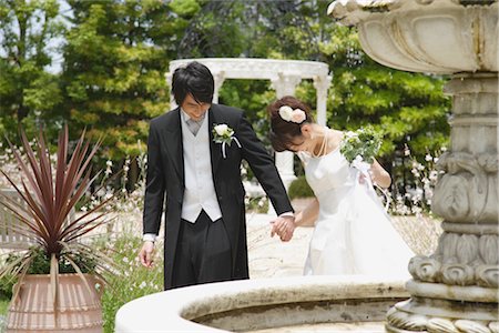 simsearch:859-03039180,k - Bride and Groom Walking in Garden Stock Photo - Rights-Managed, Code: 859-03039132