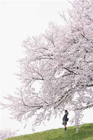 school girl skirt - Teenager Wearing School Uniform Standing in Park Stock Photo - Rights-Managed, Code: 859-03599016