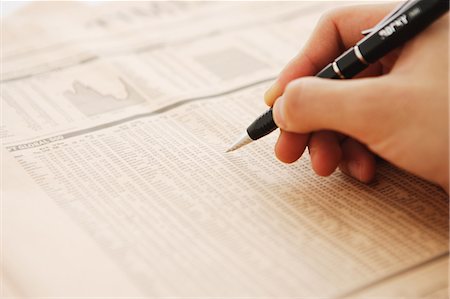 rate - Hand Marking Stocks on Newspaper Stock Photo - Rights-Managed, Code: 859-03599084