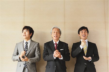 Businessmen Gleaming Stock Photo - Rights-Managed, Code: 859-03599265