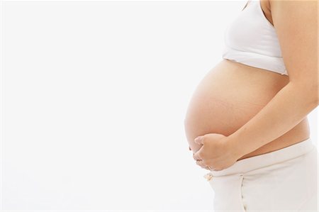 Ventre de femme enceinte Photographie de stock - Rights-Managed, Code: 859-03600083