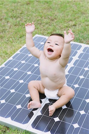 ecology - Solar Panels With Baby Stock Photo - Rights-Managed, Code: 859-03600111