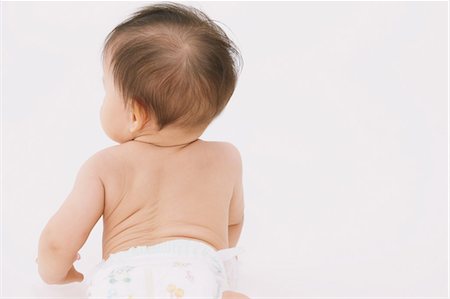 Baby Lying On Front Stock Photo - Rights-Managed, Code: 859-03600175
