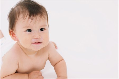 Baby Lying On Front Stock Photo - Rights-Managed, Code: 859-03600176