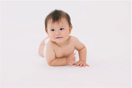 Baby Lying On Front Stock Photo - Rights-Managed, Code: 859-03600178
