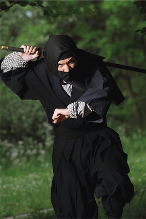 spying - Ninja Running Through Forest Stock Photo - Rights-Managed, Code: 859-03730715