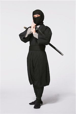 Studio Shot of Ninja on White Background Stock Photo - Rights-Managed, Code: 859-03730721