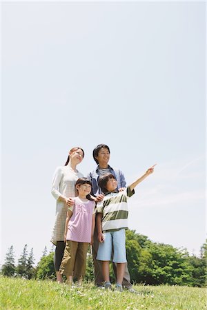 Family Enjoying In a Park Stock Photo - Rights-Managed, Code: 859-03755378