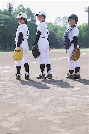 determined youth sports - Amis de baseball regardant en arrière Photographie de stock - Rights-Managed, Code: 859-03755425