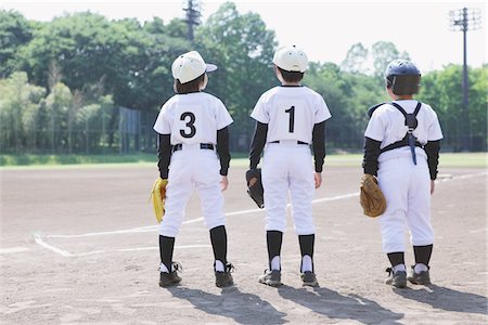 playing baseball - Joueur de baseball au terrain de Baseball Photographie de stock - Rights-Managed, Code: 859-03755422